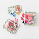 Bumkins Clear Travel Bag 3-Pack: Cacti lays flat on a white background, holding toiletries, makeup, and travel accessories.