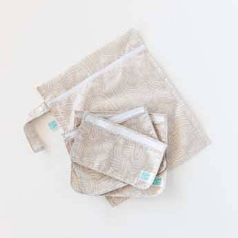 Bumkins Wet Bag + Clear Travel Bag 3 Pack Set: Wander—stylish, reusable bags perfect for travel and on-the-go parents.