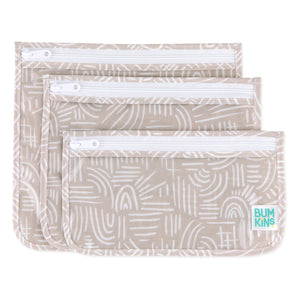 Bumkins Clear Travel Bag 3-Pack: Wander includes three pouches with a white abstract pattern on beige waterproof fabric and white zippers.