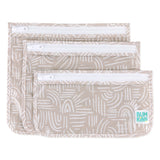 Bumkins Clear Travel Bag 3-Pack: Wander includes three pouches with a white abstract pattern on beige waterproof fabric and white zippers.