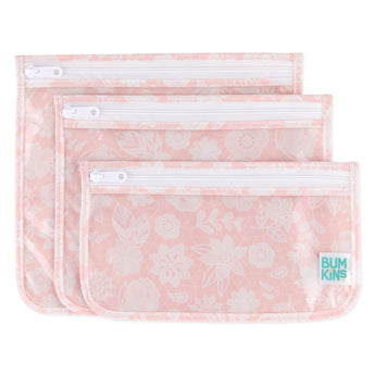 Three overlapping pink floral Clear Travel Bag 3-Pack: Lace pouches by Bumkins, perfect TSA-approved travel companions.