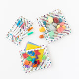 Three bags from Bumkins The Playdate Planner Deluxe 5-Piece Set: Mickey & Friends Varsity hold blocks and art supplies on a white background.