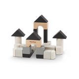 The Construction Set by PlanToys creates castle-like structures from sustainably made, black and natural wood toy blocks.