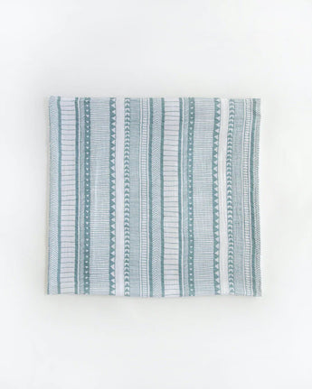 The Little Unicorn Cotton Swaddle Set, Bison features breathable cotton muslin with green and white geometric stripes. Perfect for swaddling.