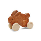 Push Bunny, Brown: brown ruberwood bunny on tan wheels with PlanToys logo.
