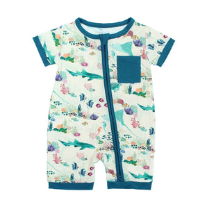Emerson and Friends Romper, Coral Reef: buttery soft bamboo with teal trim, chest pocket & diagonal zipper on white.