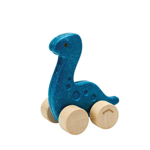 Dino Car, Diplo: blue rubberwood dinosaur toy with tan wheels with PlanToys logo.