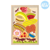 Begin Agains Ants Picnic Stacking Game poster features cartoon ants with food items like pizza and ice cream on a light background!.