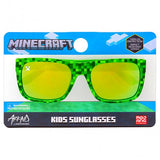 Sunstaches Arkaid Sunglasses, Minecraft Green Creeper: Stylish UV protection with fun pixelated design for kids in packaging.