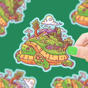 Vinyl Sticker, Tortoise Walking Island by Turtle Soup: Waterproof cartoon turtle with trees, house, and flowers on its shell.