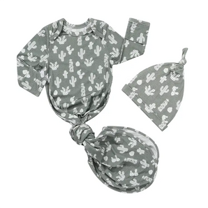 Gift the stylish Stay Sharp set by Emerson and Friends: a gray bamboo gown and hat with white cactus patterns for newborns.