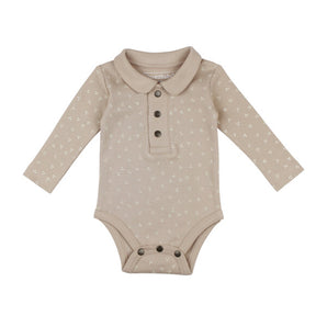 Lovedbabys Organic Polo Bodysuit, Oatmeal Dots features sustainable dyes, a collar, button closures, and a chic beige/white design.