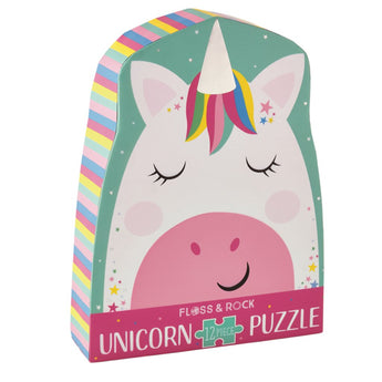 A vibrant unicorn-shaped puzzle box with a smiling face and multicolored horn, called Floss and Rock 12 Piece Rainbow Unicorn Puzzle.