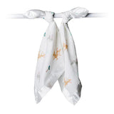The white Security Blanket, Little Fawn by Lulujo Inc., is a breathable muslin with colorful animal prints, tied elegantly at the top.