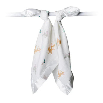 The white Security Blanket, Little Fawn by Lulujo Inc., is a breathable muslin with colorful animal prints, tied elegantly at the top.