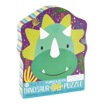 Floss and Rocks 12 Piece Dinosaur Puzzle features a green dinosaur on purple, ideal for enhancing hand-eye coordination.
