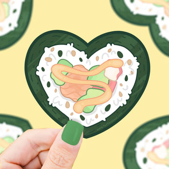 Turtle Soups Sushi Heart sticker: A cartoon hand holds a heart-shaped sushi piece on green, premium vinyl.