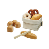 Bread Set: cream pouch with PlanToys tag, wood bread, buns, croissant, pretzel, & donut, and wood knife.