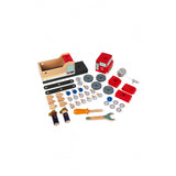 Janod Juratoys Fire Truck kit with red blocks, wheels, screws, blue toolbox. Includes wrench & screwdriver.