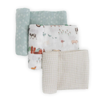 Three folded blankets by LouLou Lollipop: blue pattern, farm animals, and beige checkered from the Cotton Swaddle Set, Farmyard.