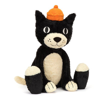 Jellycat Jack Huge, the plush tuxedo cat by Jellycat, sits upright with a pumpkin hat and velour crown.