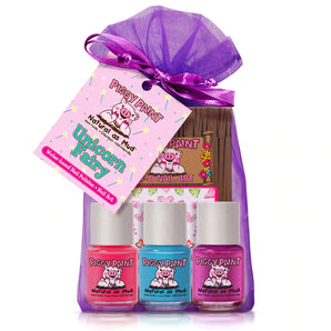 Purple gift bag includes the Piggy Paint Unicorn Fairy set: 3 colorful, non-toxic nail polishes & a cruelty-free nail art set.