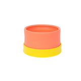 Morepeas Essential Snack Bowl in orange silicone with a yellow suction base, displayed on a white background.