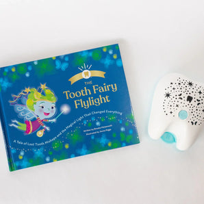The Tooth Fairy Flylight Box Set by Tooth Fairy Flylight is perfect for your childs lost tooth tradition with its storybook projector nightlight.