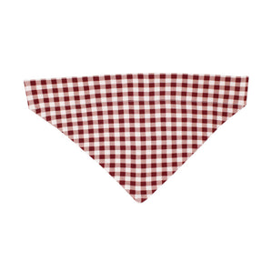 The Holiday Pet Bandana, Crimson Plaid by Lovedbaby features a red and white checkered pattern on a crisp white background, crafted from organic cotton using eco-friendly dyes.