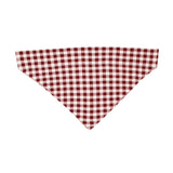 The Holiday Pet Bandana, Crimson Plaid by Lovedbaby features a red and white checkered pattern on a crisp white background, crafted from organic cotton using eco-friendly dyes.