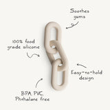 The Mushie Links Teether, Tradewinds are beige silicone links that ease sore gums, 100% food-grade, BPA-free, and easy to hold.