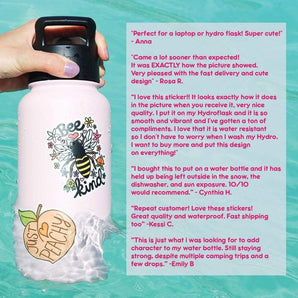 A Turtle Soup pink bottle with bee and peach designs, featuring scratch-resistant Desert Dweller Big Foot stickers, shines by the pool.