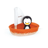 PlanToys sustainable Sailing Boat, Penguin is crafted from PlanWood and features an orange sailboat with a white PlanToys sail.