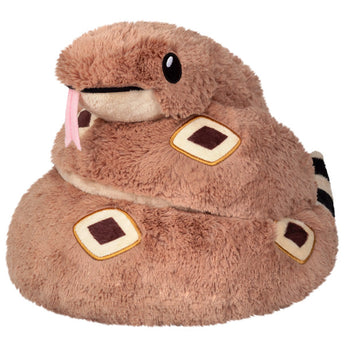 The Squishable Plush Rattlesnake features round eyes, a pink tongue, and diamond patterns on a white backdrop; its a misunderstood noodle.