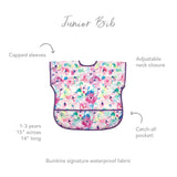 Bumkins Junior Bib: Watercolor features a floral design, capped sleeves, adjustable neck, and catch-all pocket in easy-clean waterproof fabric.