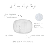 Infographic of Bumkins Silicone Grip Tray: 100% food-safe platinum silicone, strong suction base, open plate design, easy to clean.