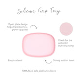 Infographic of Bumkins Silicone Grip Tray: 100% food-safe platinum silicone, strong suction base, open plate design, easy to clean.