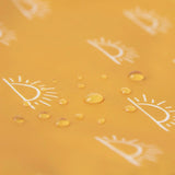 Close-up of water droplets on a yellow Bumkins Reusable Snack Bag, Large 2-Pack: Sunshine and Grounded.