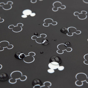 A Clear Travel Bag 3-Pack by Bumkins features a Mickey Mouse icon pattern in black and white with water droplets.