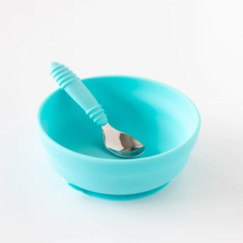 Bumkins Silicone Grip Bowl: Blue sits on a white background with a matching spoon inside.
