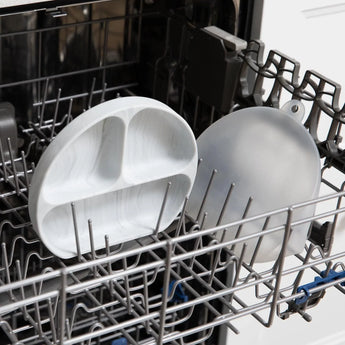 Two Silicone Grip Dish with Lid (3 Section): Marble by Bumkins are dishwasher-safe on the top rack, perfect for toddler portions.