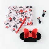 A splat mat, silicone dish, and utensils from Bumkins Disney Little Ones Gift Bundle: Minnie Mouse Classic on a white background.