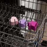 Bumkins Silicone Little Dipper 3-Pack: Lollipop sits in the top rack of an open dishwasher.