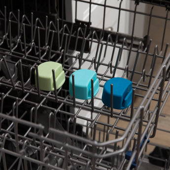 Bumkins Silicone Little Dipper Round 3-Pack: Gumdrop sits in the top rack of an open dishwasher.