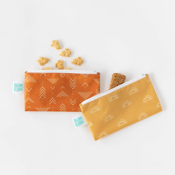 Bumkins Reusable Snack Bag, Small 2-Pack: Sunshine and Grounded holds bunny-shaped crackers & a granola bar on a white background.