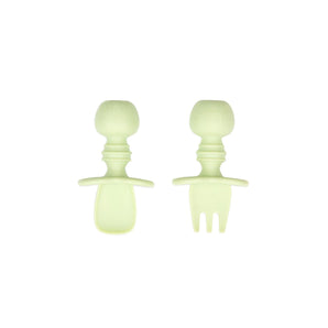 Bumkins Silicone Chewtensils®: Sage—two light green utensils with rounded handles made from 100% food-safe silicone.