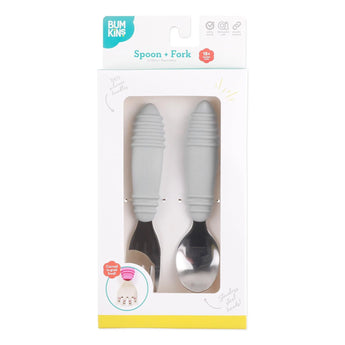 The Bumkins Spoon + Fork: Gray set offers ergonomic silicone utensils, perfect for self-feeding toddlers 18+ months.
