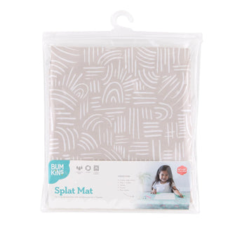 Bumkins Splat Mat: Wander is shown folded in plastic packaging bag with a hanger and cardboard insert.
