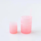 Bumkins Silicone Starter Cup: Pink sits next to another pink cup on a white background.