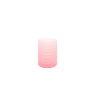 Bumkins Silicone Starter Cup: Pink is a cylindrical cup with measurements that helps baby's transition to open cup drinking.